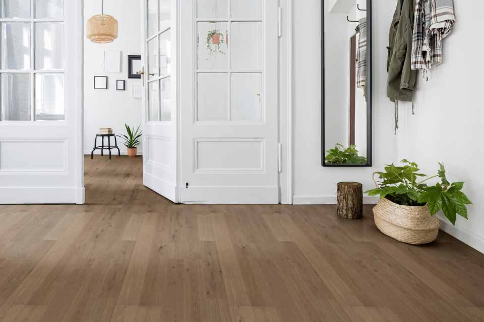 solid hardwood flooring in white modern entryway